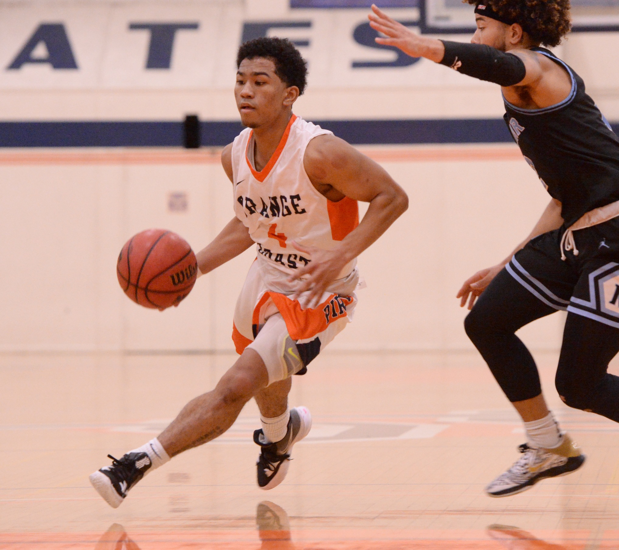Strong first half propels Pirates past Dons, 91-77