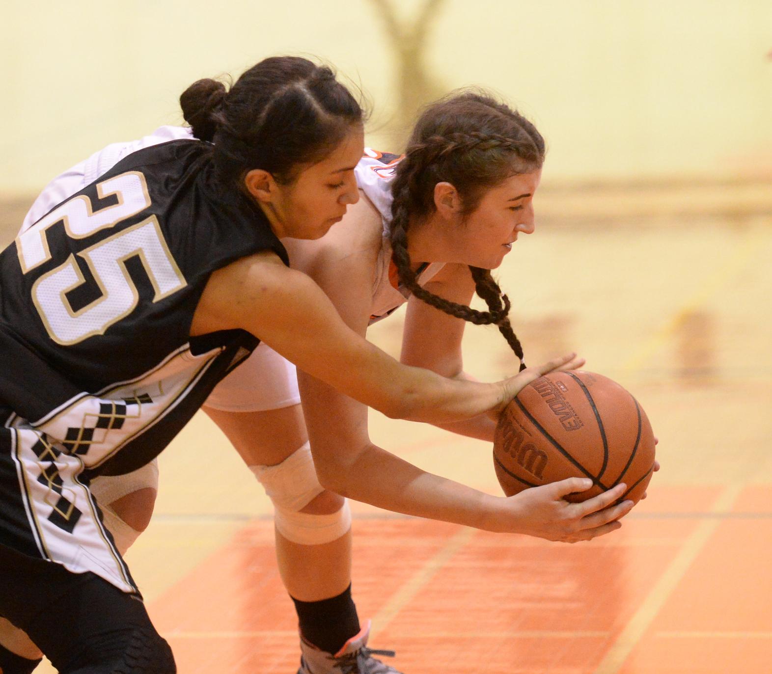 Pirates return favor on Raiders, win 65-49