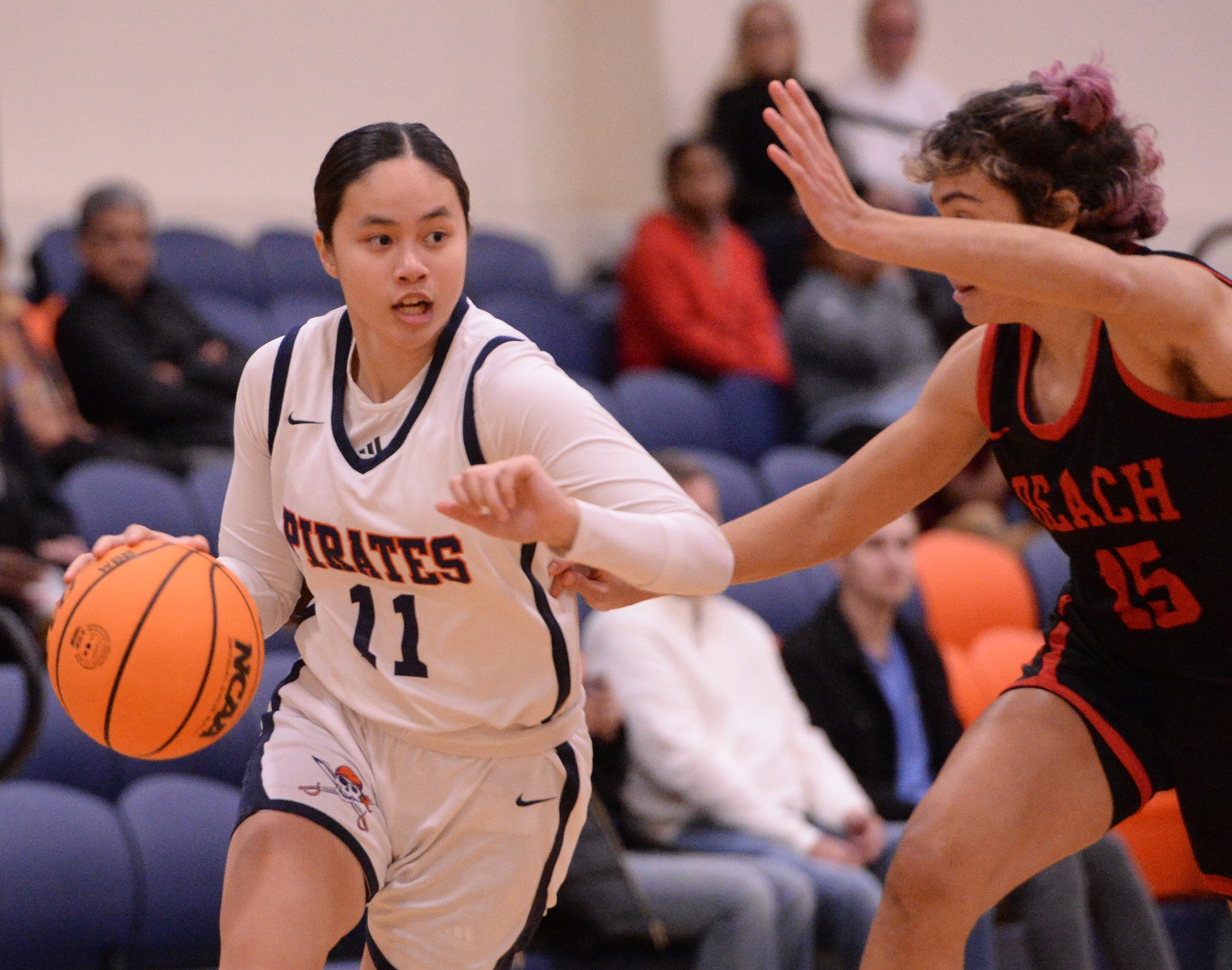 Pirates grind out 66-57 win over rival Lasers